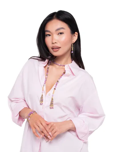 Model wearing a parure in 925 sterling silver with purple agate, green agate, moonstone and zirconia