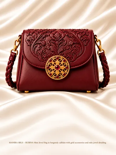 Burgundy leather mini-bag with a clasp in gold and rubies