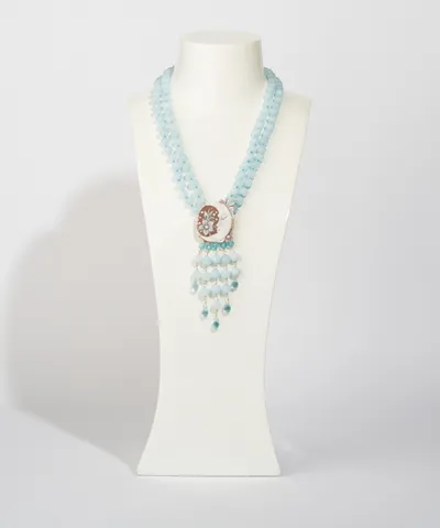Multi-strand blue agate necklace with an enamelled cameo