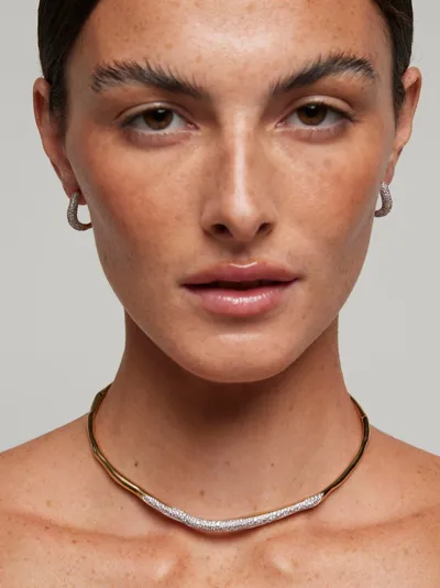Sogni – Model wearing a Scolpiti Collection choker with a pavé centre and pavé hoop earrings, silver with 18-karat gold plating