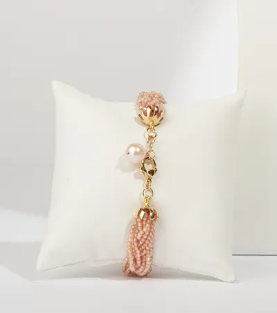 Peach-toned bracelet with a cultured pearl and gold-plated silver details