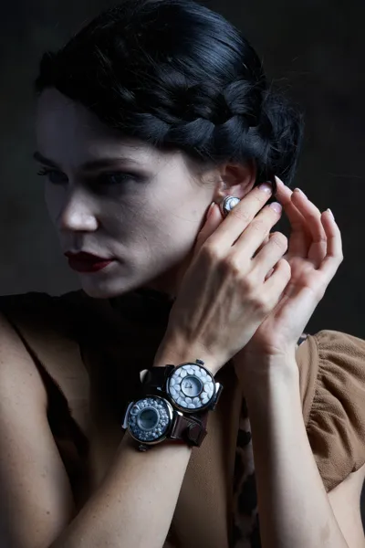 Model wearing watches with hand-carved shell cameos, Partenope collection