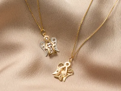 Angel pendants in 9-karat gold, the iconic symbol of Roberto Giannotti