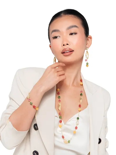 Model wearing a parure in 925 sterling silver with lemon quartz, strawberry quartz, green agate and yellow agate