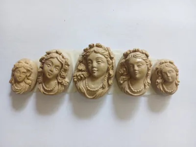 Hand-carved lava cameos for a bracelet