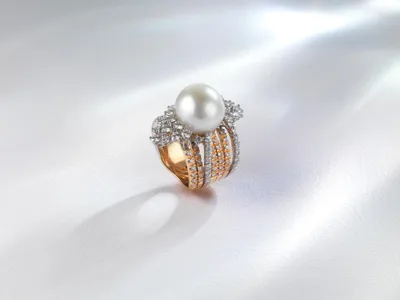 Ring with a large white pearl and diamonds in rose and white gold
