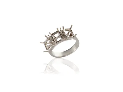 White gold three-stone ring mounting with empty prong settings