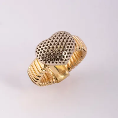 Yellow gold tubogas ring with a white gold heart mounting with empty pavé settings
